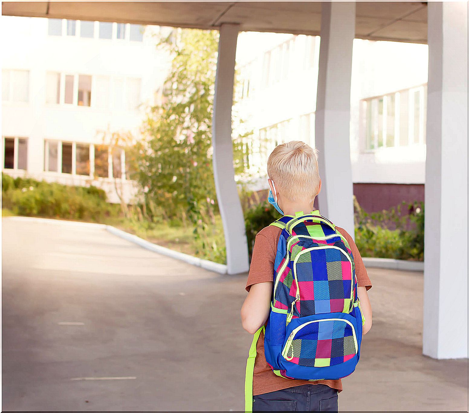 Boy going to his new school.