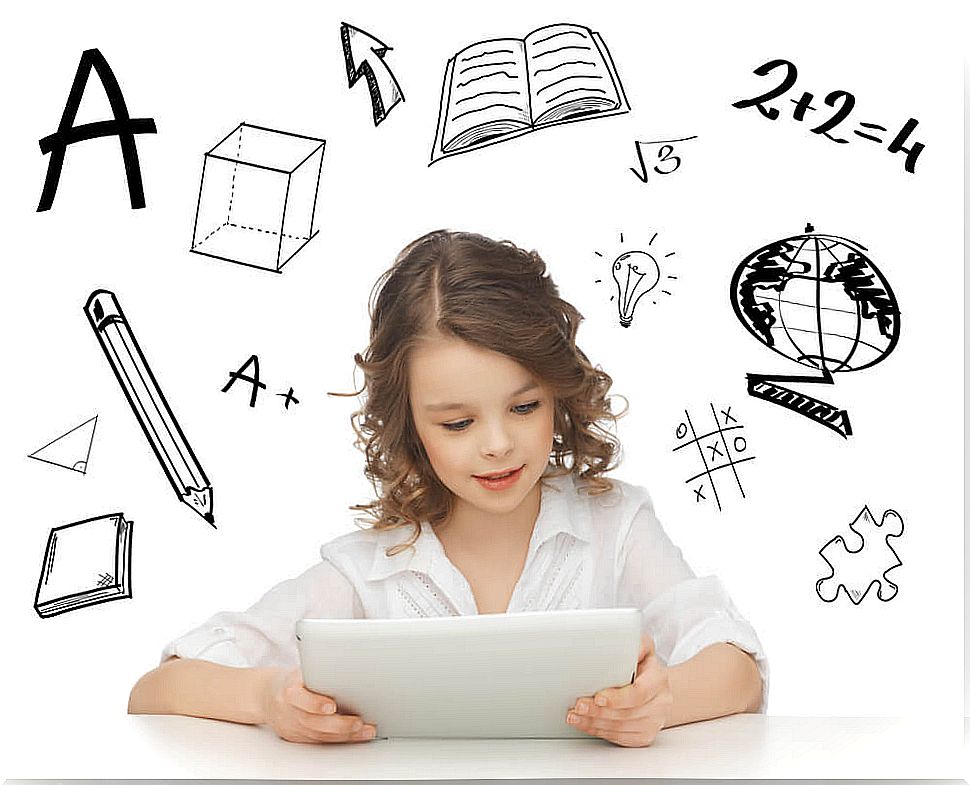 Little girl with a tablet using educational applications.