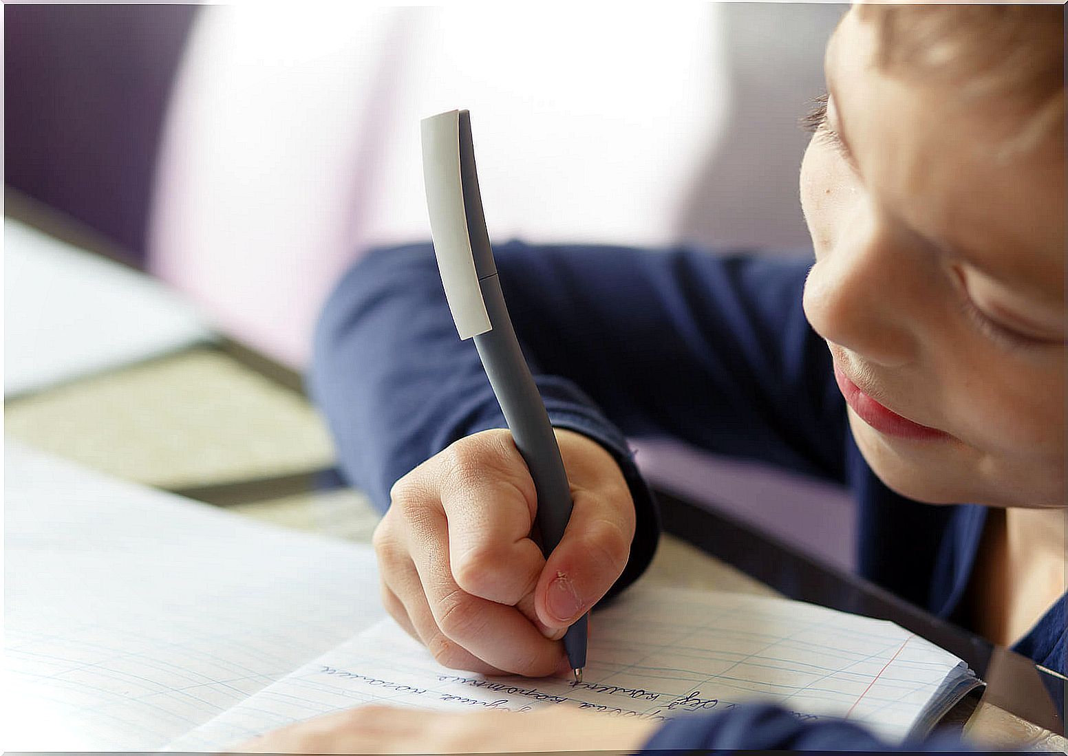 Child doing activities to work on written expression at home.