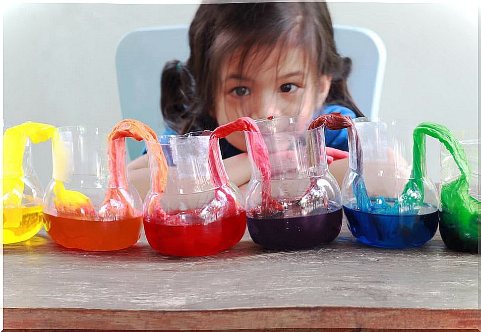 Girl with an experiment with water.