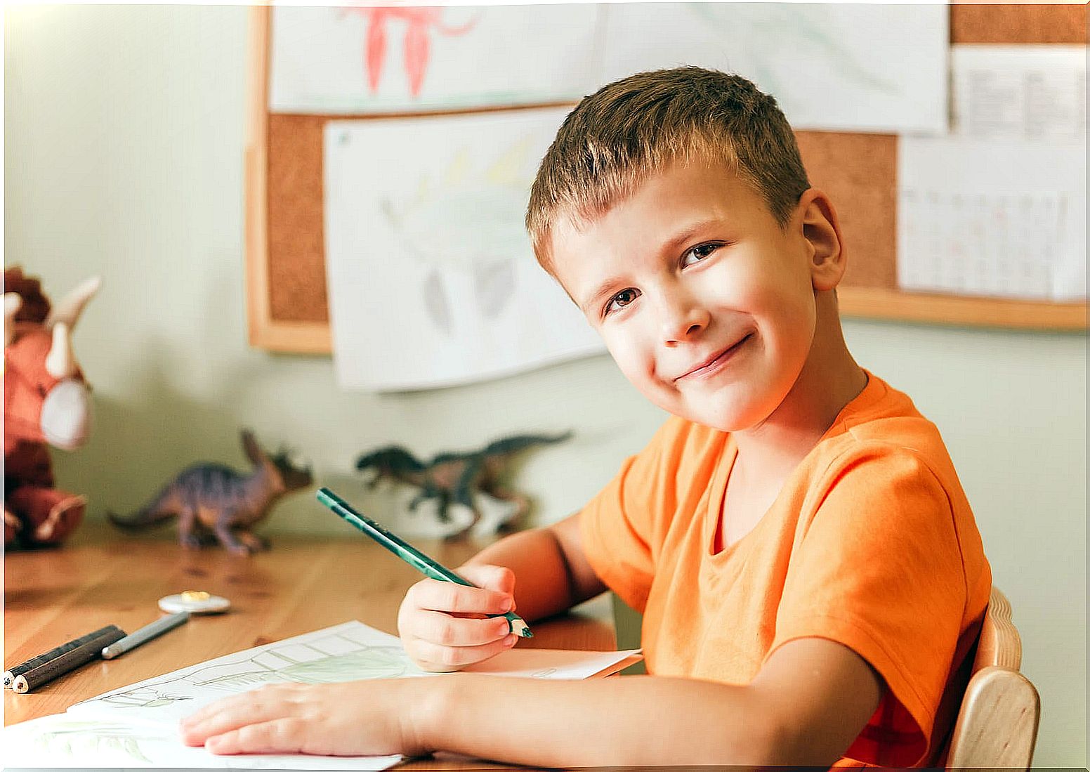 Child learning to write by hand.