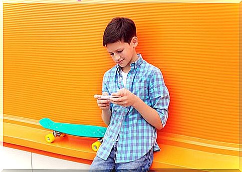 Child with the phones playing children's apps to learn math.