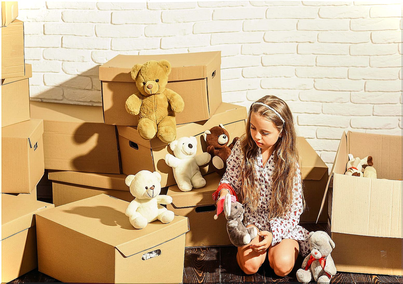 Only daughter girl playing with her stuffed animals.