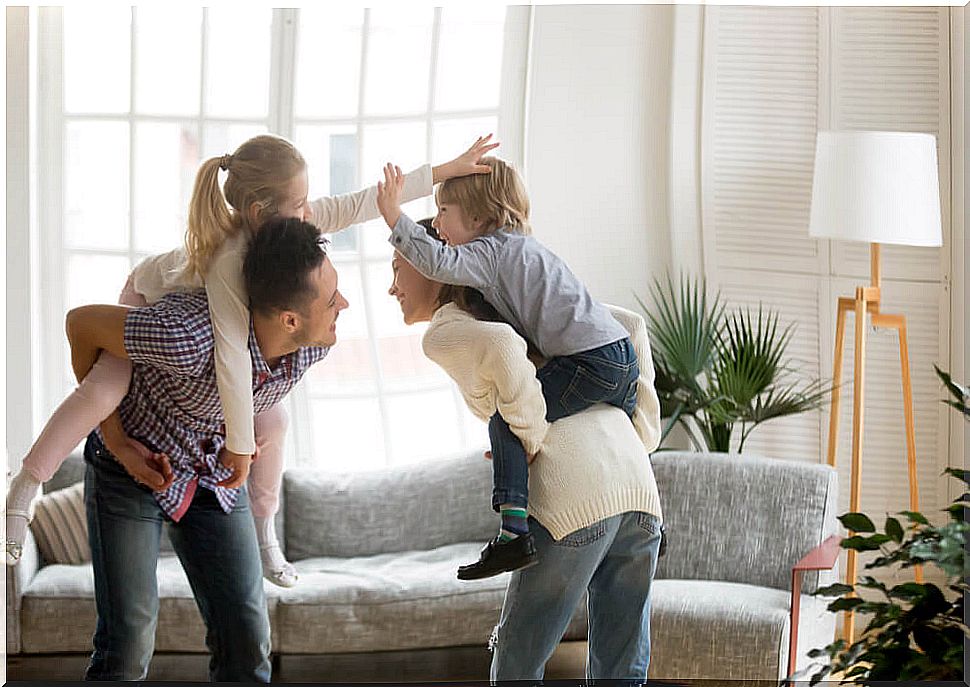 Father playing with his children during quarantine.