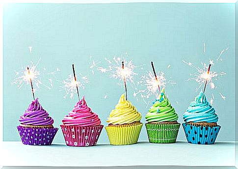 Birthday cakes with sparklers.