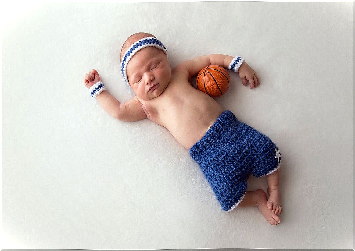 Claim motherhood!  A player breastfeeds her daughter at a basketball game