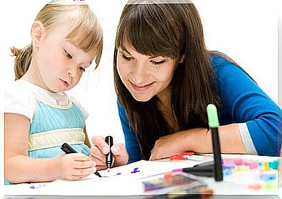 mother and daughter having fun in kindergarden