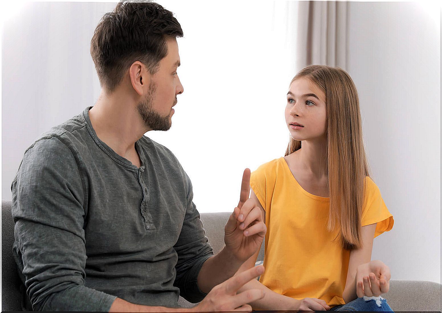 Father talking to his daughter about difficult things.