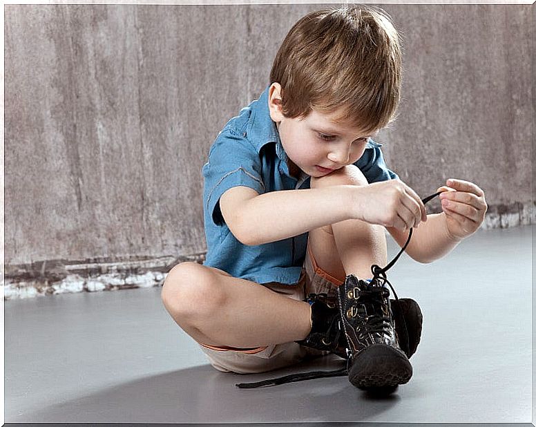 Teaching a child to tie shoelaces takes practice and patience.