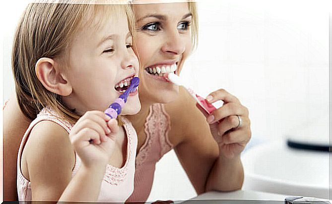 Good habits like oral hygiene are best passed on by example.